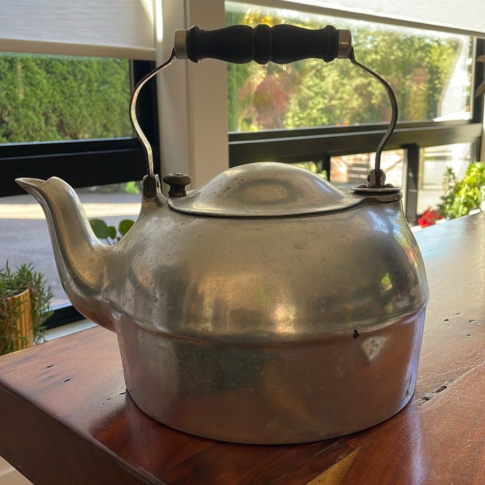 Russian tea kettle. Stainless. Old. Has markings “Griswold” “Erie”.